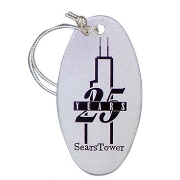 1.25" X 2.25" Aluminum Oval Ornament With A One Color Screened Imprint And An Assembled Tassel