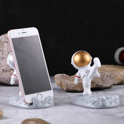 Creative astronaut phone holder