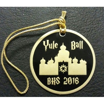 1.5" Round Ornament With A One Color Die struck, color filled imprint and Metallic String.