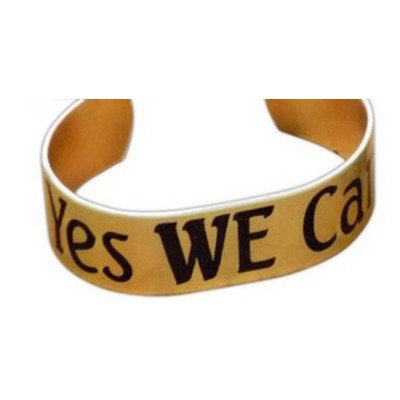 Aluminum cuff bracelet (5.5" x 3/4 wide) with a screen printed imprint. Made in the USA