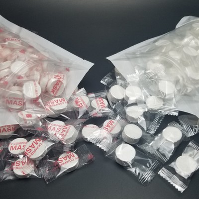 Magic Compressed Coin Tissue in Candy Wrapper