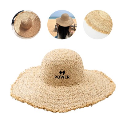 Wide brimmed raffia straw hat